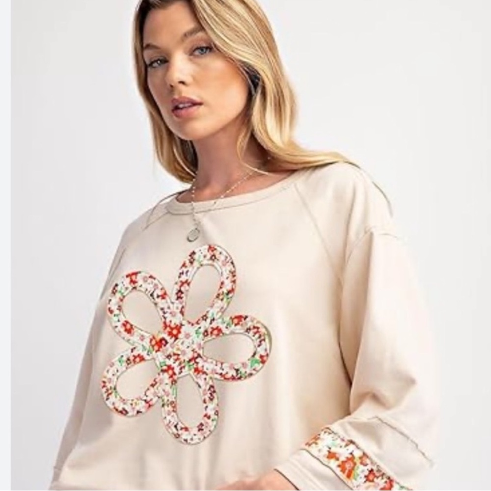 23. Floral Embellished Cream Top
